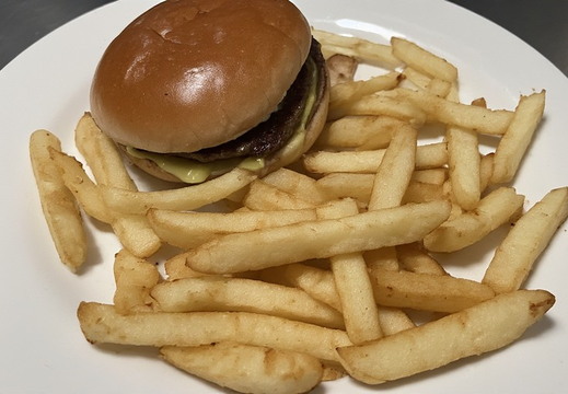 A small burger and a generous serving of french fries