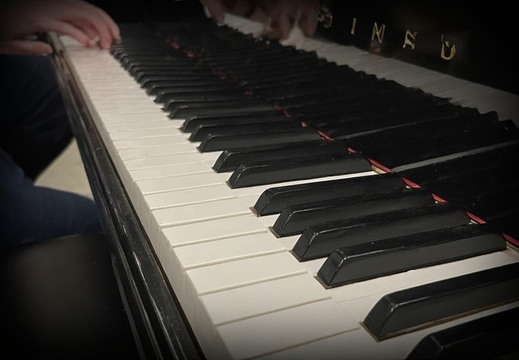 A person playing a piano