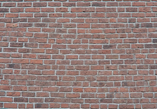 A weathered brick wall.